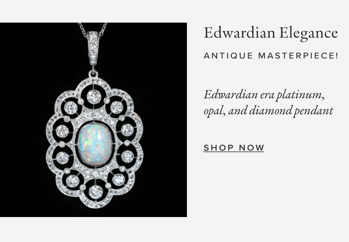 Edwardian Elegance | Antique Masterpiece: Edwardian era platinum, opal, and diamond pendant. Click to shop now.