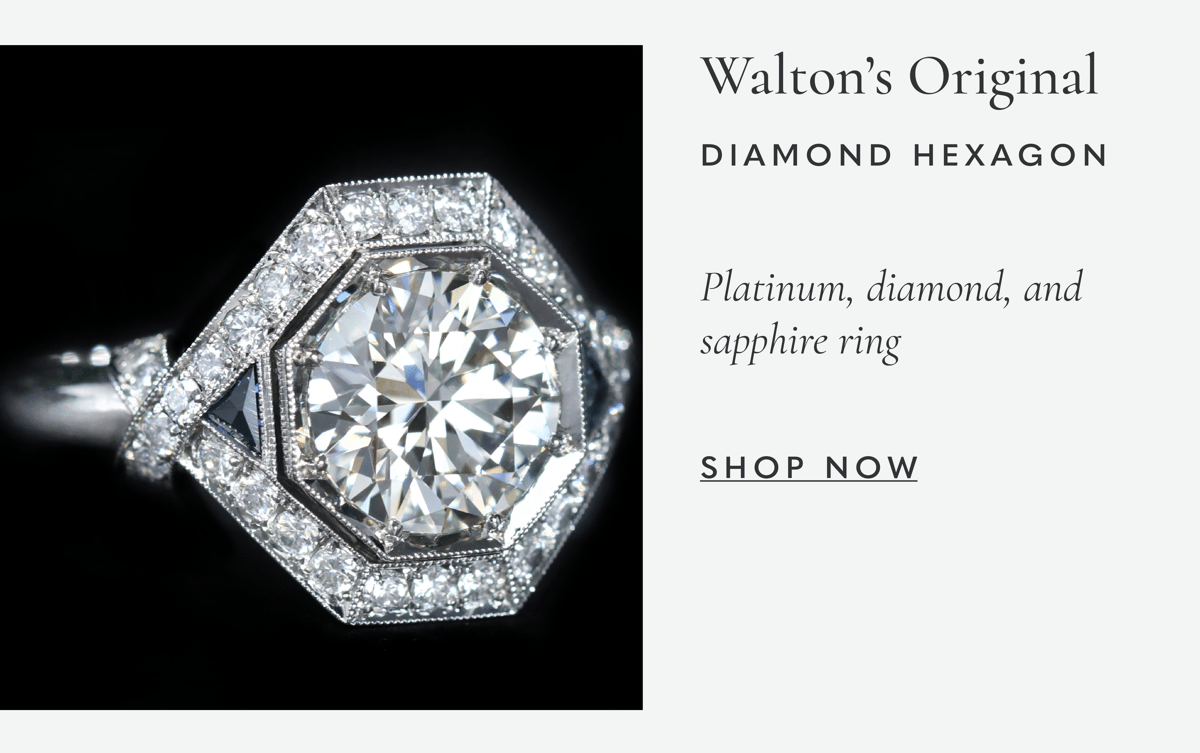 Platinum, diamond, and sapphire ring. Shop now >